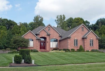 Red brick home typical of real estate in Palomar, Kentucky